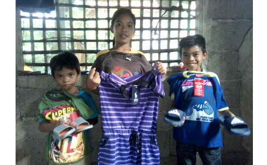 Jen and her siblings gladly received clothes from her sponsor