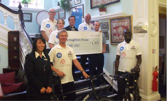 Delivering the cheque to Broughton House!