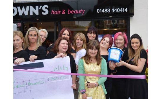 halow young person ready to cut the ribbon