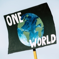 Image of the earth with the text: one world 